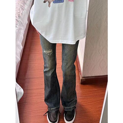 American-style vintage washed distressed ripped bootcut jeans for women, high-waisted, slim-fit, figure-flattering, floor-length trendy pants.