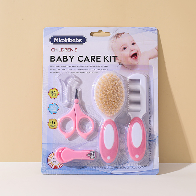 Envases en inglés transfronterizo Juego de cuidado de cepillo de peine de lana para bebés Tijeras de seguridad para bebés Herramienta de limpieza de cortaúñas