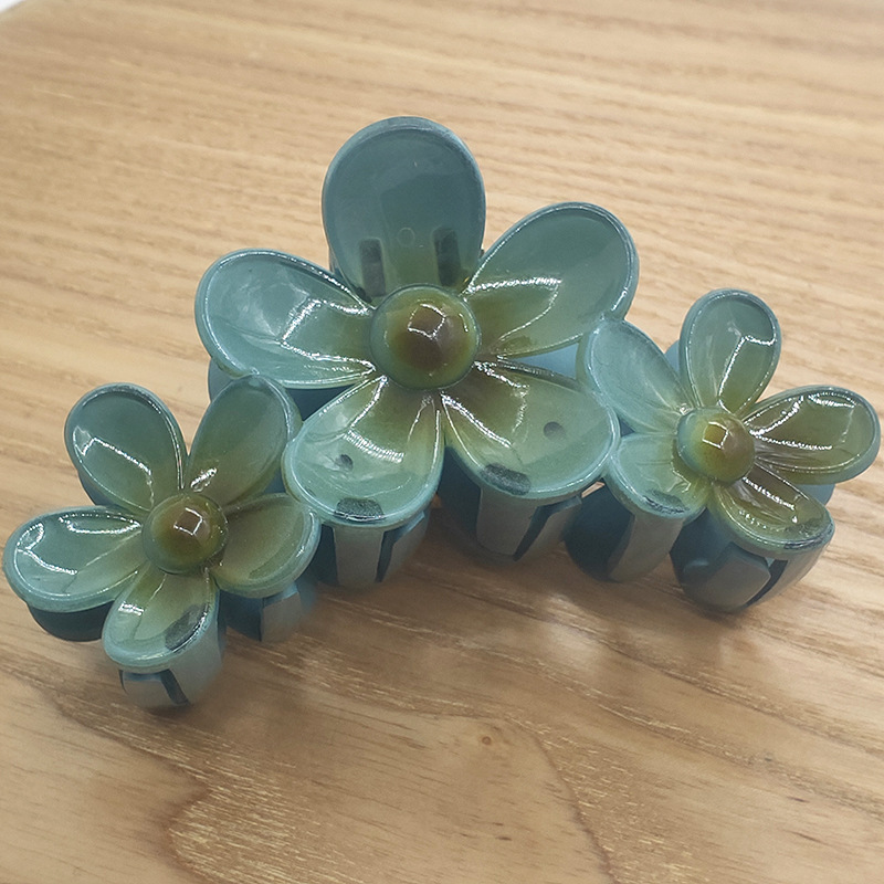 国境を越えたアマゾンの卵の花がグラデーションの花のキャンディー色の紫荊花の後頭部をつかんでサメの花を挟んで髪を伸ばします。|undefined