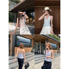 夢に向かってDT ETOLIE海島ギャルは首のストラップのベストを着ています。