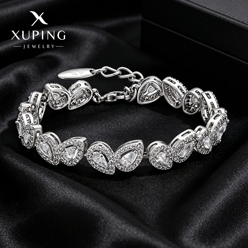 Xuping estilo simple incrustación de joyas preciosas artificiales pulseras de aleación de cobre chapado gotas de agua blanca lujosa ligera joyas al por mayor