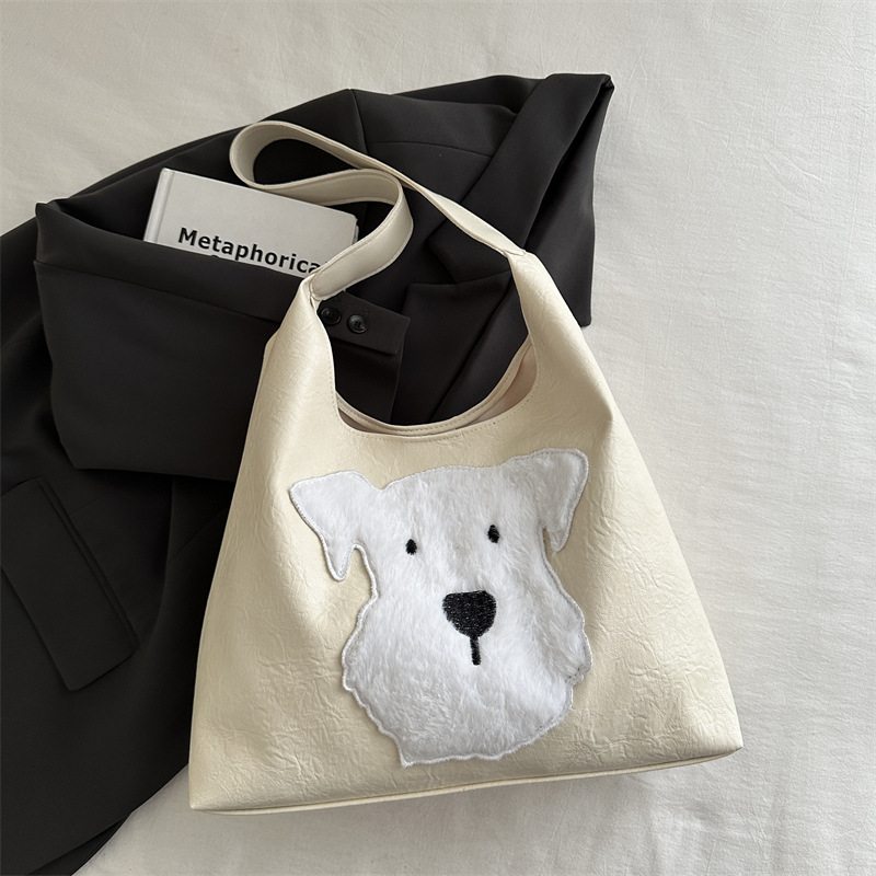 Simple y de alto valor exterior de moda bajo la axila 2024, otoño y invierno nuevo estilo coreano de gran capacidad de bolso de hombro de dibujos animados