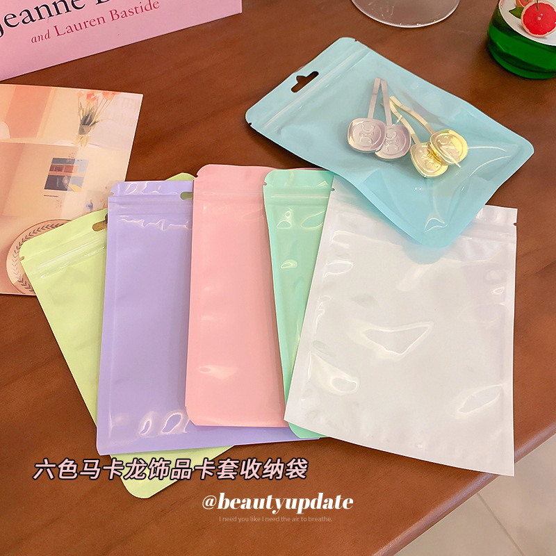 Macaron color bolsa de autosellado bolsa de plástico engrosada transparente color hueso bolsa de almacenamiento sellado bolsillo maquillaje cepillo bolsa de embalaje