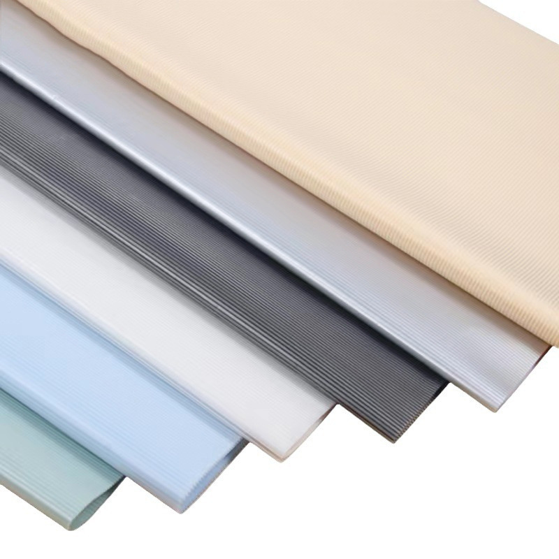 Fábrica de fiestas de flores al por mayor nueva línea de textura flor embalaje florista de color sólido papel de envoltura flor