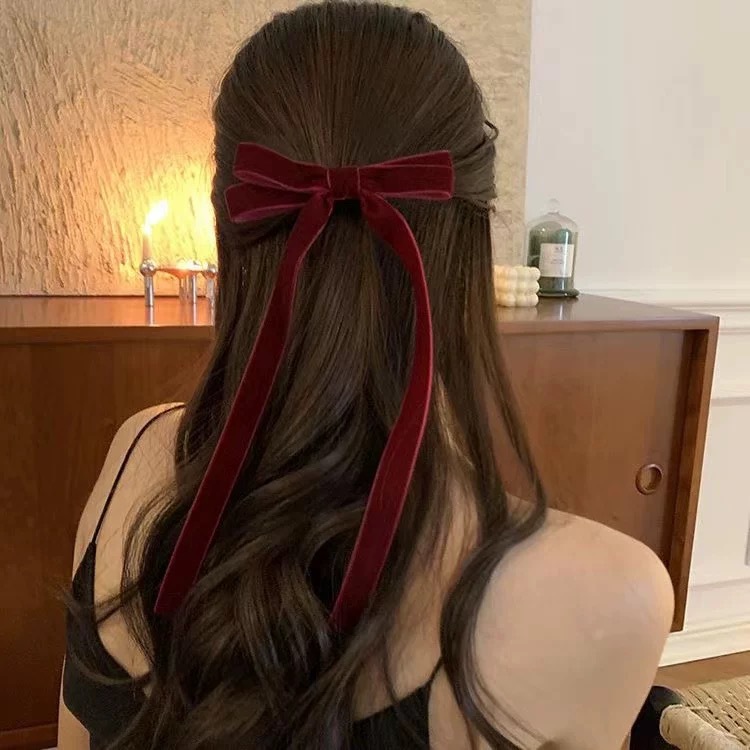 Burgundy hair accessory for bride