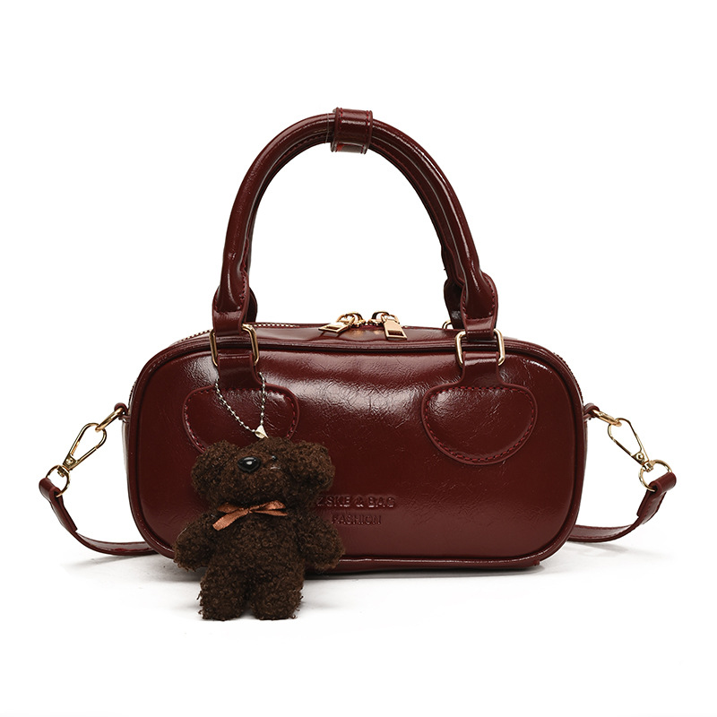 Bolsa de bolos super caliente popular de este año para mujeres 2025, nueva bolsa de hombro de tendencia universal, bolso de mano de estilo extranjero.