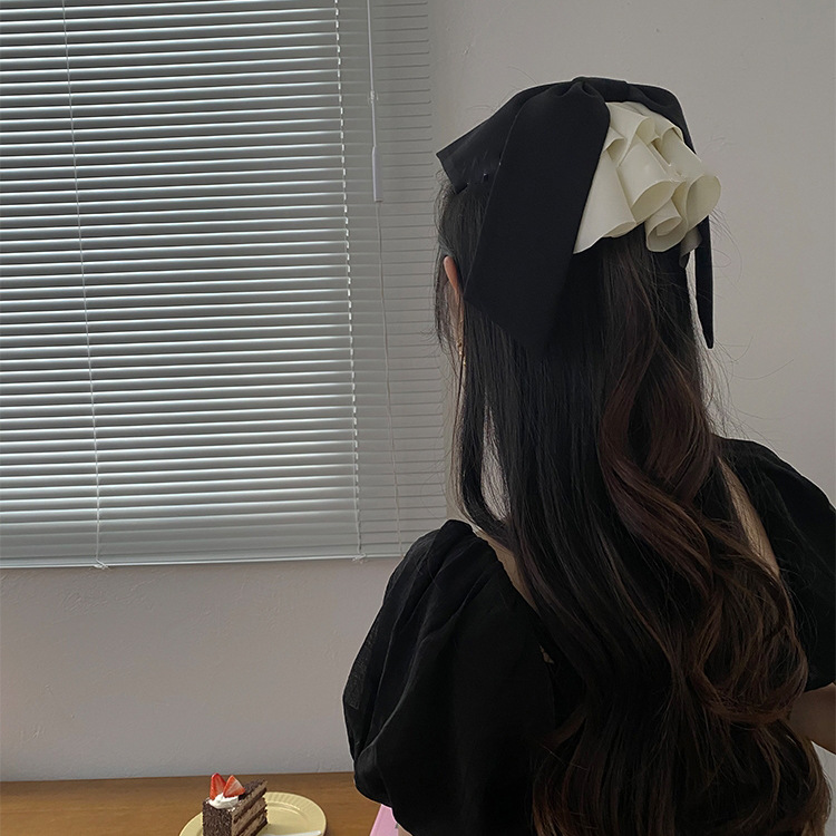 Fermaglio per capelli con fiocco in raso accessorio elegante_voghion.com