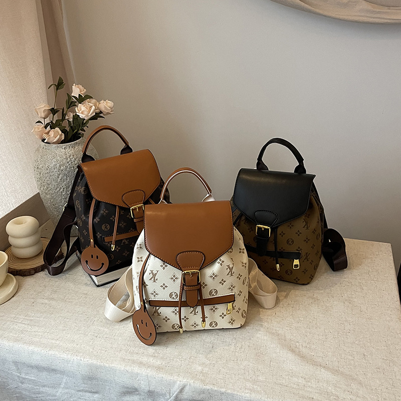 Mochila retro para mujer, mochila de color de contraste de gran capacidad para todo fósforo 2024 nuevo bolso de mujer estampado de alto valor de moda europea y americana