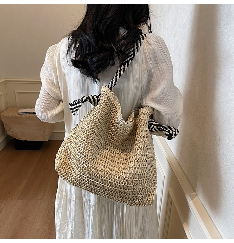Summer large-capacity straw woven bag for women, 2025 new style seaside and beach vacation single-shoulder bag, commuter tote bucket bag undefined