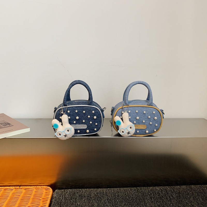 Bolsos para niños coreanos 2026 nuevos bolsos de perlas para niños y niñas lindos conejos para salir bolsos pequeños