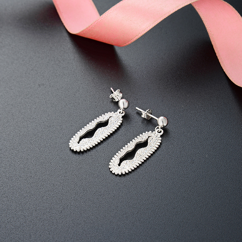 Joyas de moda europeas y estadounidenses de comercio exterior 925 plata esterlina damas geométrica exagerada hueco pendientes de zircón largos pernos