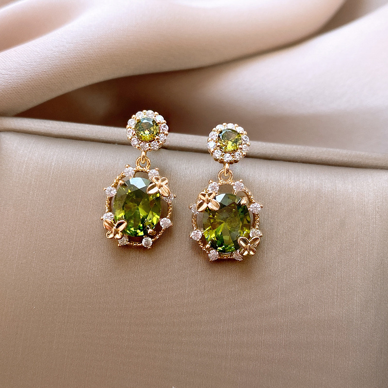 Pendientes de esmalte de color geométrico con goteo de aguja de plata, pendientes de metal verde femenino, exagerados, dulces y frescos, pendientes de todo fósforo personalizados al por mayor