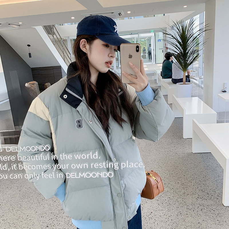Ropa de béisbol suave coreana de color de invierno para mujeres de nuevo estilo de cuello vertical ropa de pan suelta coreana pequeña chaqueta de algodón suelta