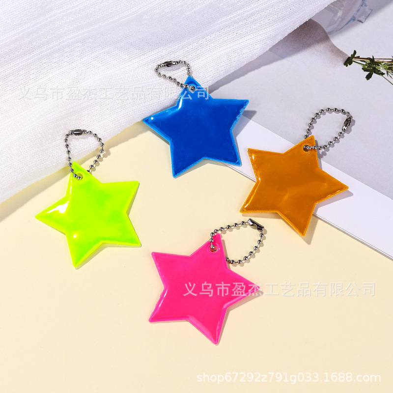 Amazon 5 cm colgante de color reflectante estrella de PVC de noche colgante de bolsas de llaves