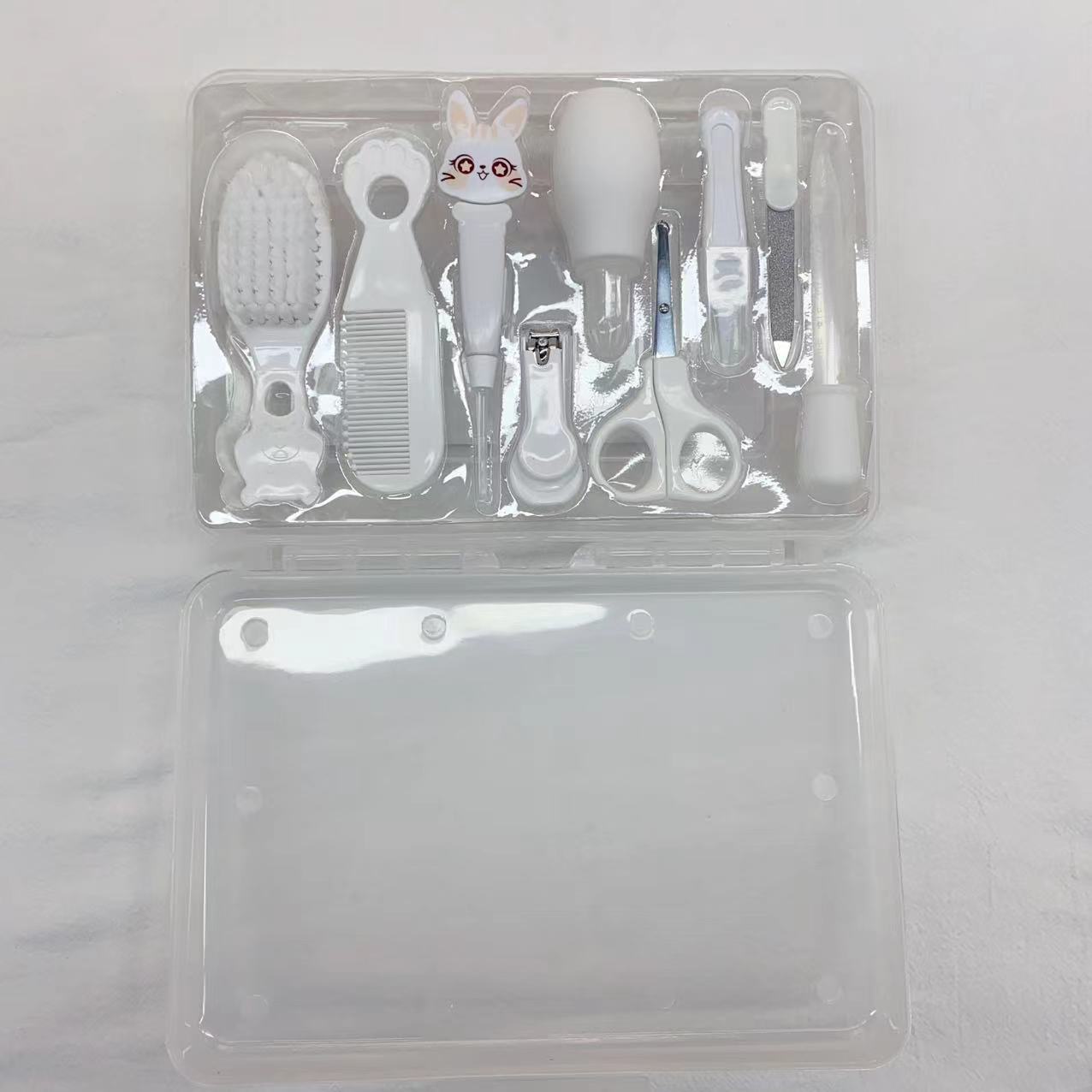Comercio exterior Juego de cuidado de bebés Cortaúñas para bebés Herramientas de cuidado de cepillos de dientes Peine Cepillo Caja de almacenamiento Juego de 9 piezas image 13