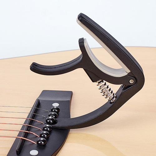 Guitar capo factory direct sales folk capo electric acoustic guitar metal big hand ukulele capo
