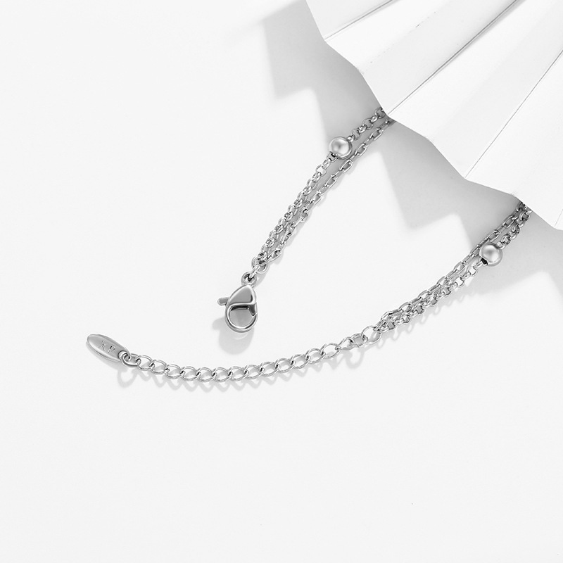 Xupar joyería europea y americana simple moda pulsera de doble capa aleación blanco redondo borla personalizada pulsera de estilo frío para las mujeres