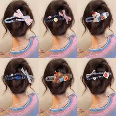 高級感のあるボタンの蝶結びのヘアピンの女性の後頭部のカモの口は大きいサイズのサメのクリップを挟みます。