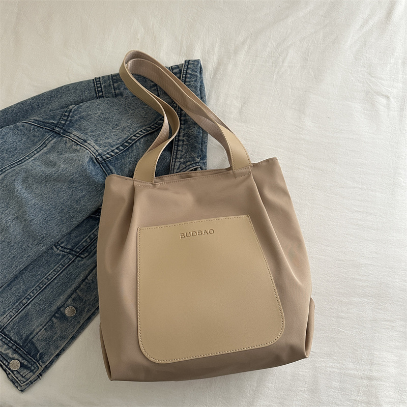 Bolso de mano simple 2024 invierno nuevo bolso de ocio versátil ains este año, bolso de hombro coreano para mujeres