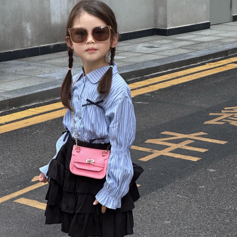 Nuevo bolso de cambio infantil coreano de moda de color sólido mini mochila de bebé comercio exterior accesorios de cadena bolsa de moda
