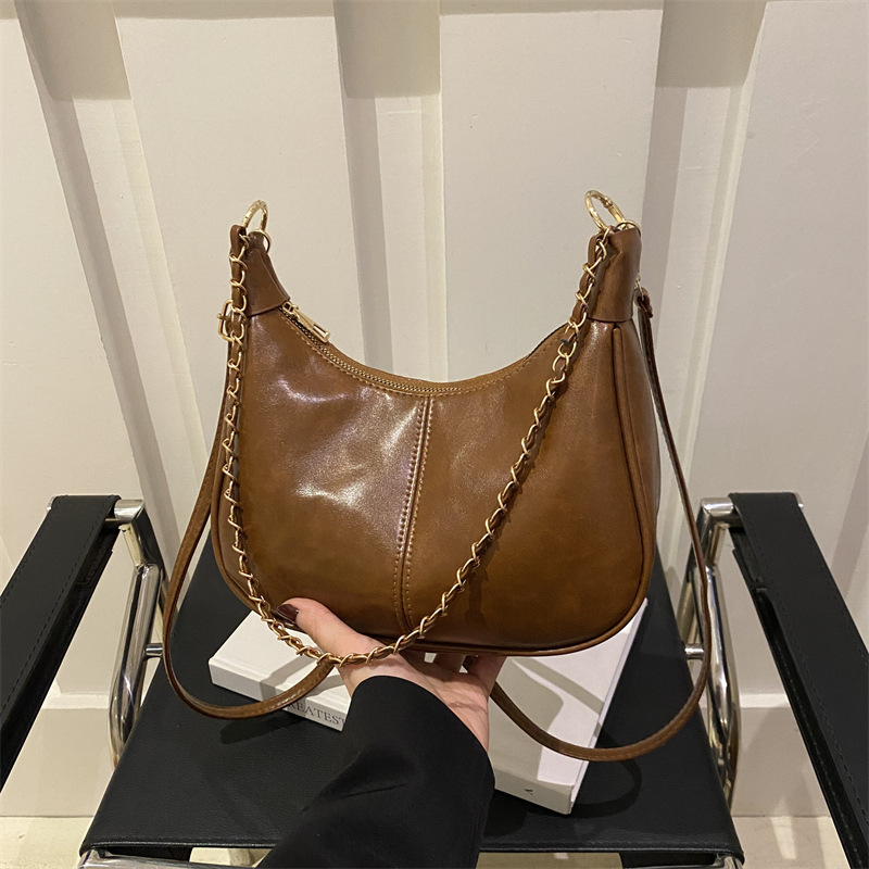 Bolsa de cadena de textura para mujeres de gran capacidad 2025, nuevo bolso de mujer simple PU, bolso de hombro de moda empalmado mochila