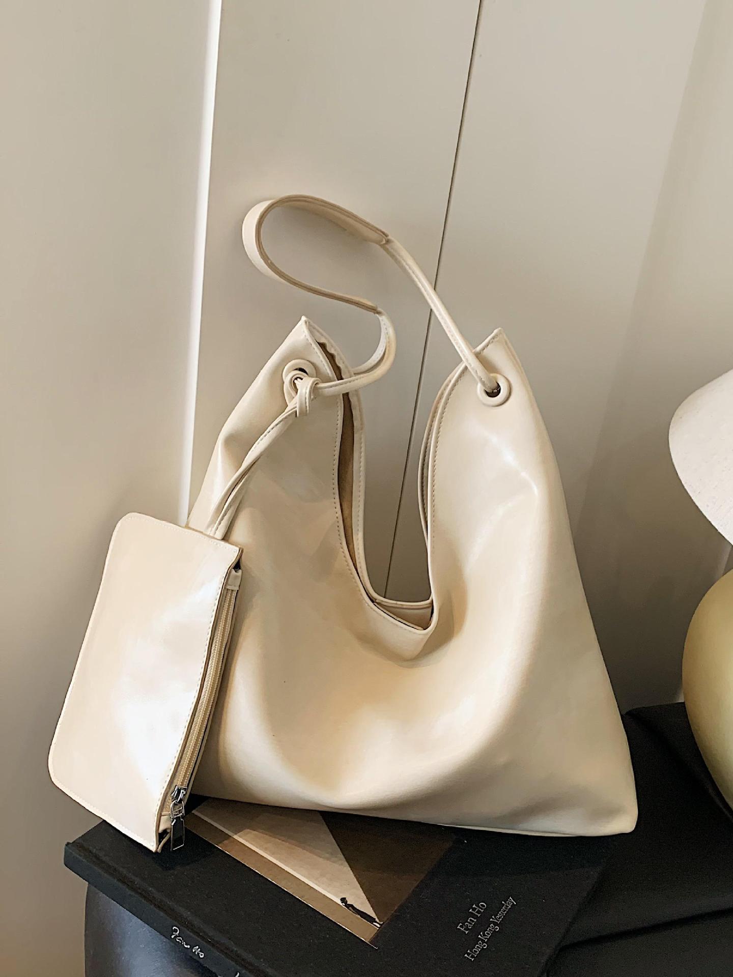 Nuevos productos transfronterizos más vendidos Bolso de cuero suave para axilas para mujer 2025 Modelo súper caliente Bolso de hombro de gran capacidad de viento perezoso