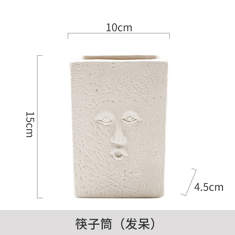 Venta directa de fábrica Soporte de tubo de palillos simple Tubo de cerámica de lujo ligero Adornos cuadrados Cara humana creativa nórdica Tubo de almacenamiento abstracto image 7