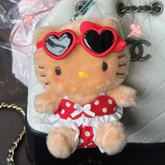 サンリオ島リゾートシリーズ黒皮kittyぬいぐるみパハ犬人形ペンダントキーホルダー