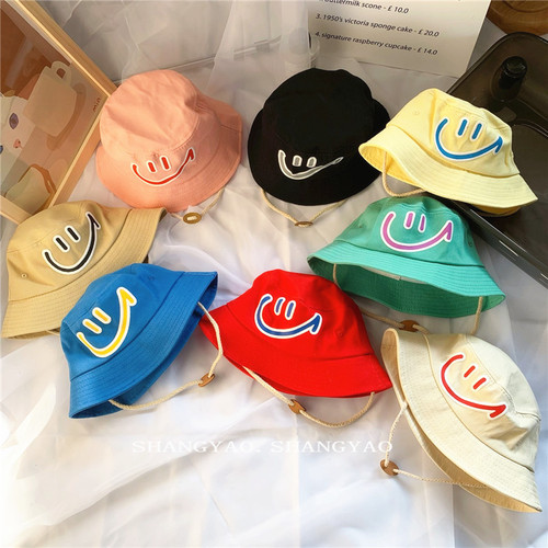 Korean-style children's hats laughing face fisherman hats candy-colored personalized unisex children versatile sunshade windproof bucket hats for outings