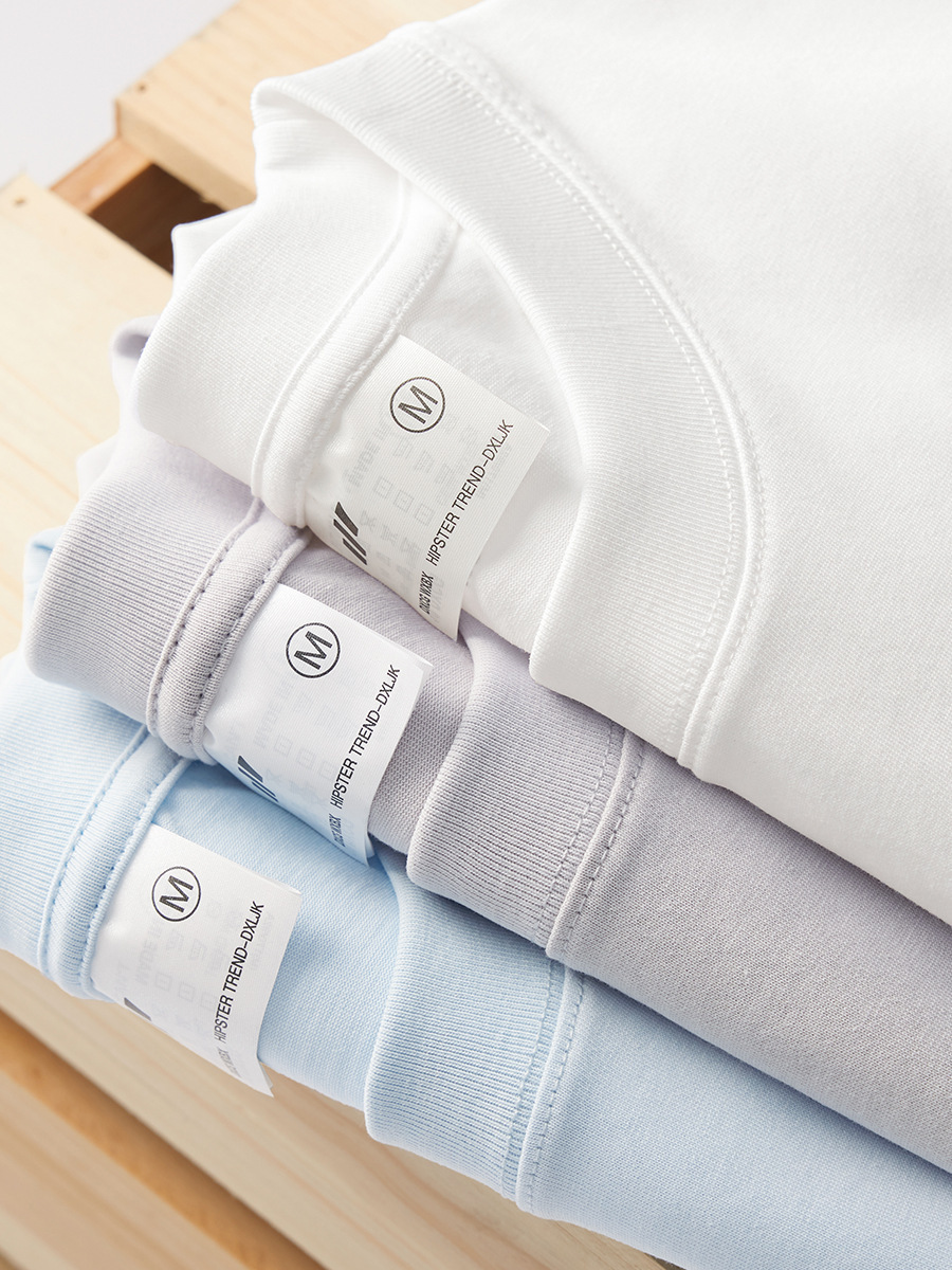 Nuevos productos de verano 260g camiseta de algodón pesado marca de moda calle suelta blanca de manga corta camisa de fondo de color sólido para hombre al por mayor