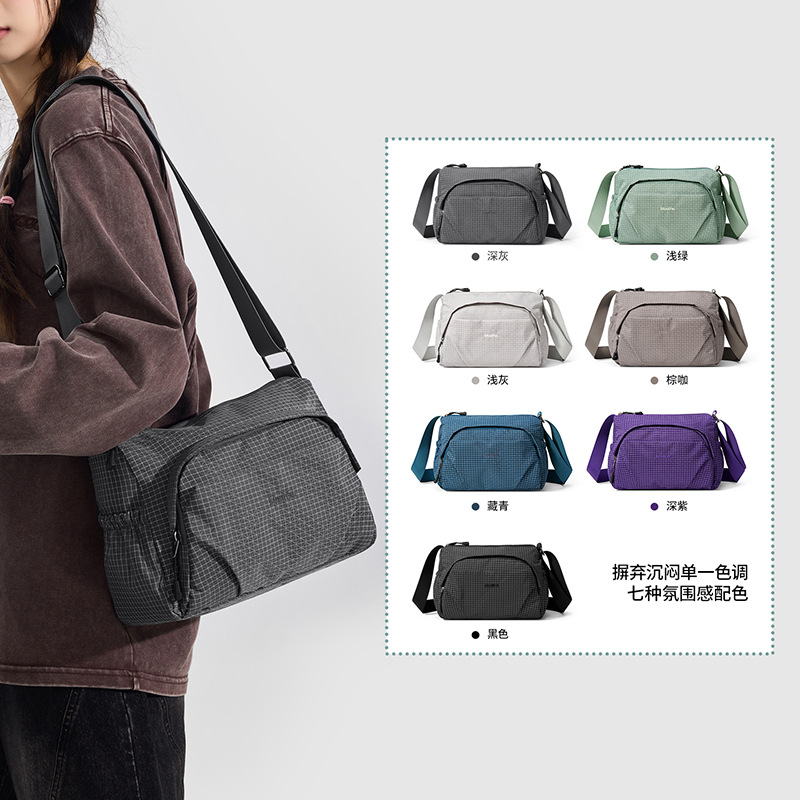 Versatile outdoor nylon casual crossbody bag for women, featuring a plaid design, underarm style, and multiple pockets; a new cross-border design, large capacity shoulder bag