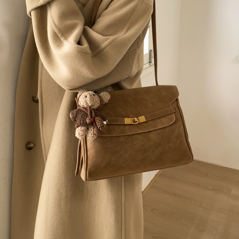 Transfronterizo coreano ligero lujoso temperamento bolso pequeño 2026 primavera nuevo estilo de transporte de hombro mochila esmaltado bolso de mano Kelly