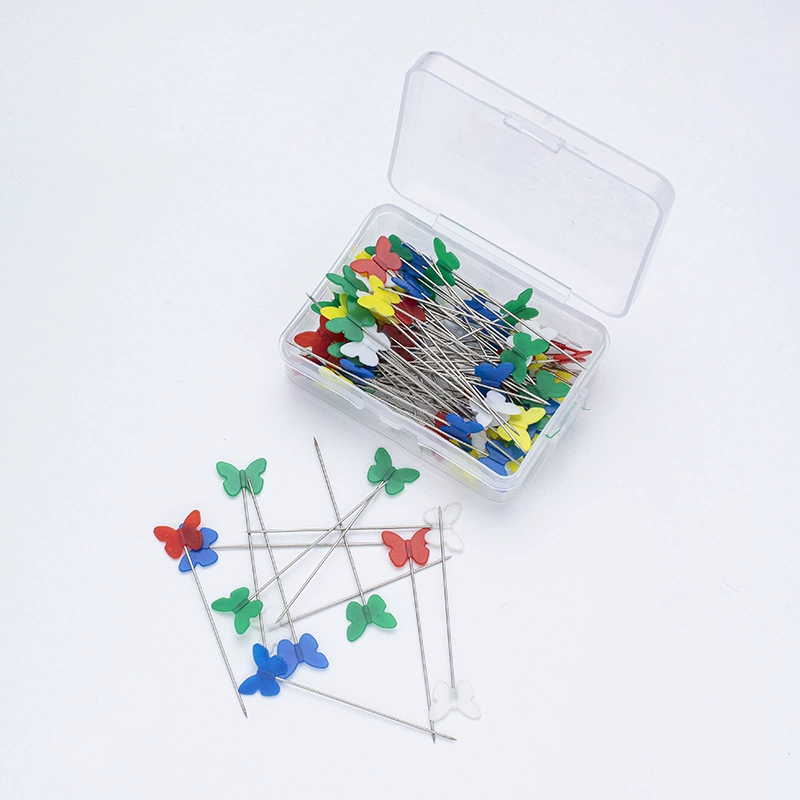 Производитель цветных кнопок-бабочек, булавок-головок, булавок для ручного шитья в коробках, булавок-цветов, булавок-сердец, булавок-цветочных головок.