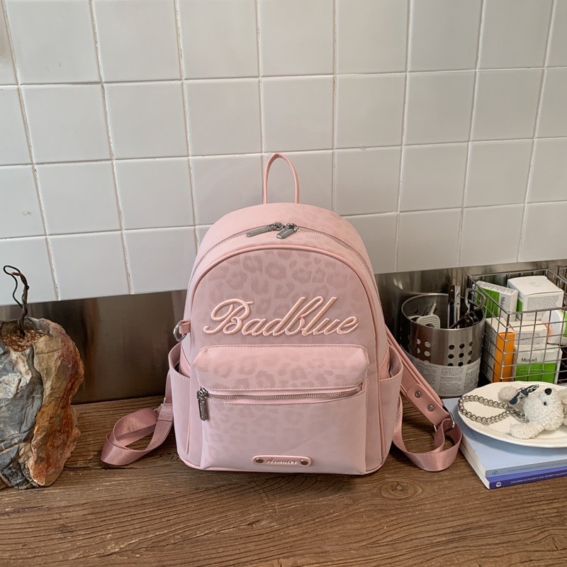 Estudiantes exquisitos nicho nuevo mochila 2026 popular mochila de hombro para viajar estampado de leopardo simple mujer gran capacidad de verano