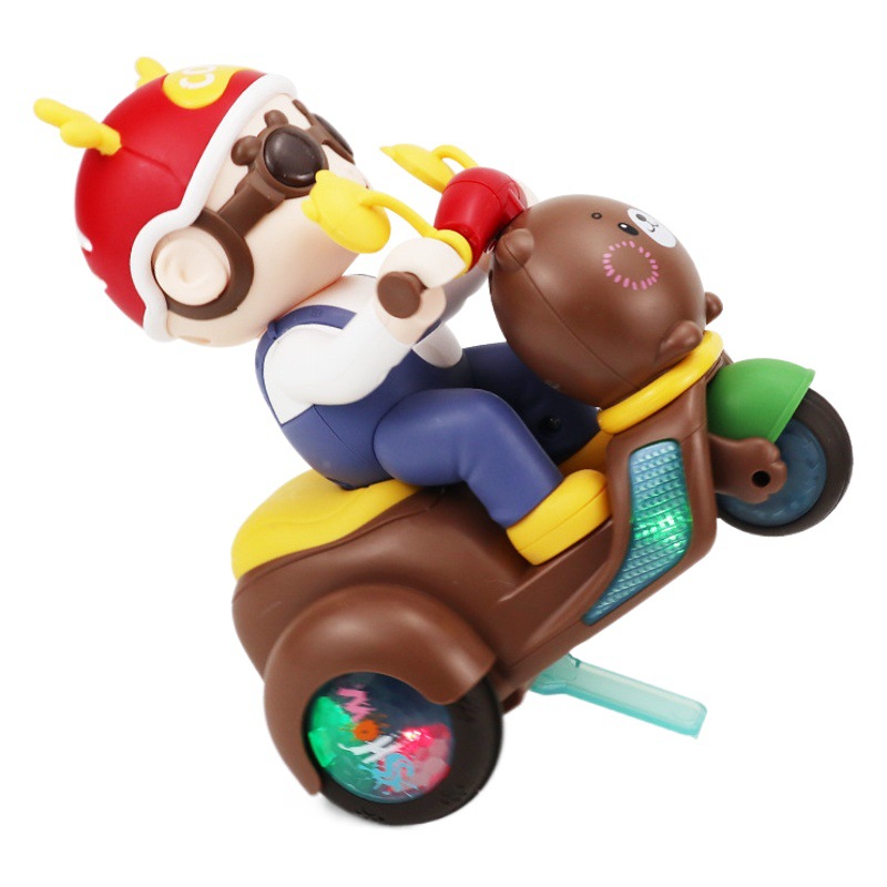 Tiktok mismo truco eléctrico triciclo giratorio juguete para niños muñeca de dibujos animados juguete de música ligera al por mayor