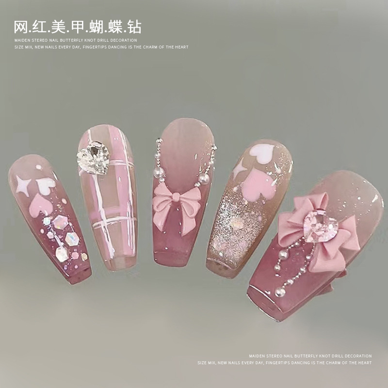 Super flash todo partido tridimensional pila diamante amor uñas accesorios al por mayor Celebridad en línea Guerrero arco accesorios de uñas