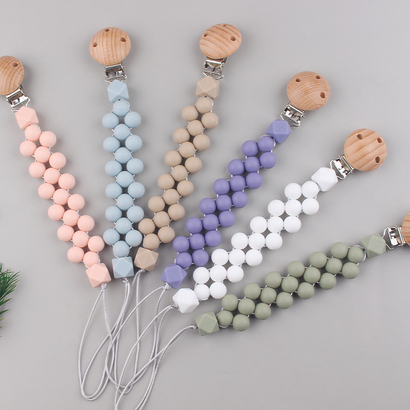 Productos para bebés Clip de chupete de madera de haya Cuentas de colores de dibujos animados para bebés creativos Morderse los dientes Cadena de chupete anti-caída