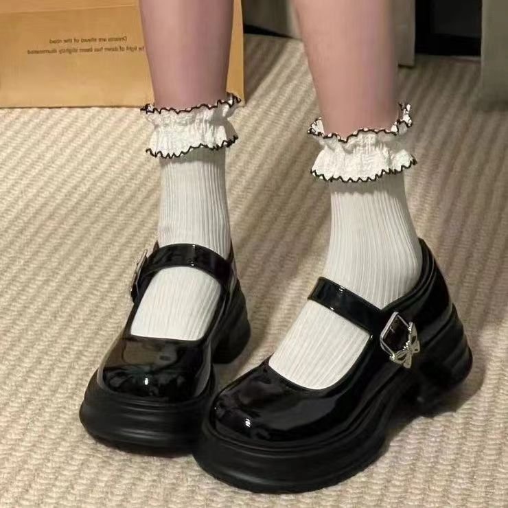 Zapatos de cuero franceses de Marizhen para mujeres 2025 primavera nueva cabeza negra redonda japonesa con suela gruesa de tacones altos retrógrados zapatos para mujeres