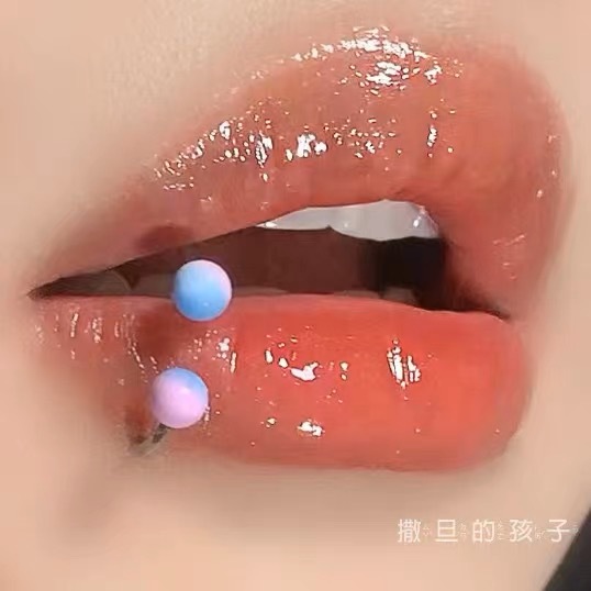 Labret stud lip piercing jewelry styling detail