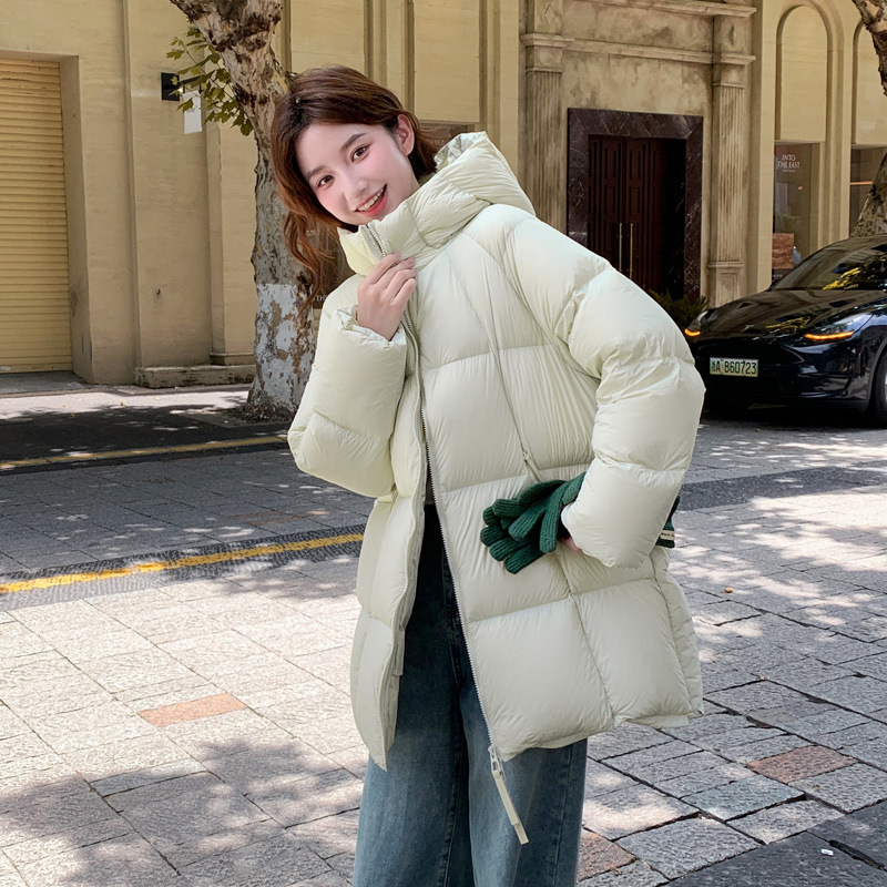 2025 invierno de algodón largo y medio nuevo suelto engrosado chaqueta de algodón con capuchón caliente fábrica directa