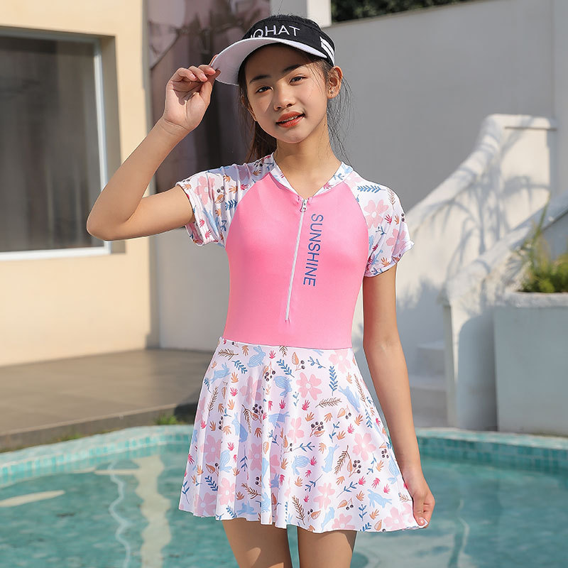 Nuevo traje de baño para niños pantalones cortos de una sola pieza para niñas manga corta cremallera de protección solar traje de baño para niñas medianas y grandes para niñas adolescentes