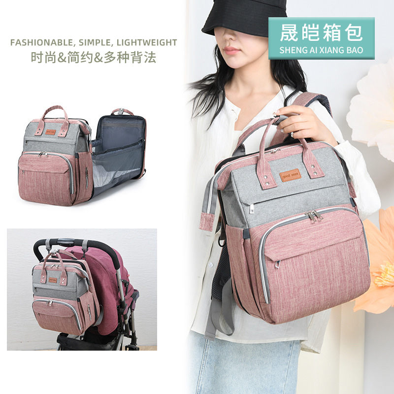 국경 간 어머니 가방 다기능 엄마와 아기 가방 배낭 우유 가방 접이식 침대 기저귀 가방 대용량 미라 가방