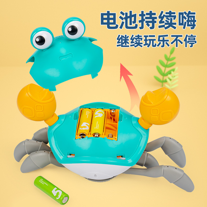 国境を越えた子供の電気誘導カニのおもちゃの赤ちゃんは歩くことができます。