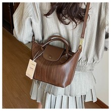 定制大容量手提托特包简约通勤百搭女士单肩包个性休闲小众斜挎包