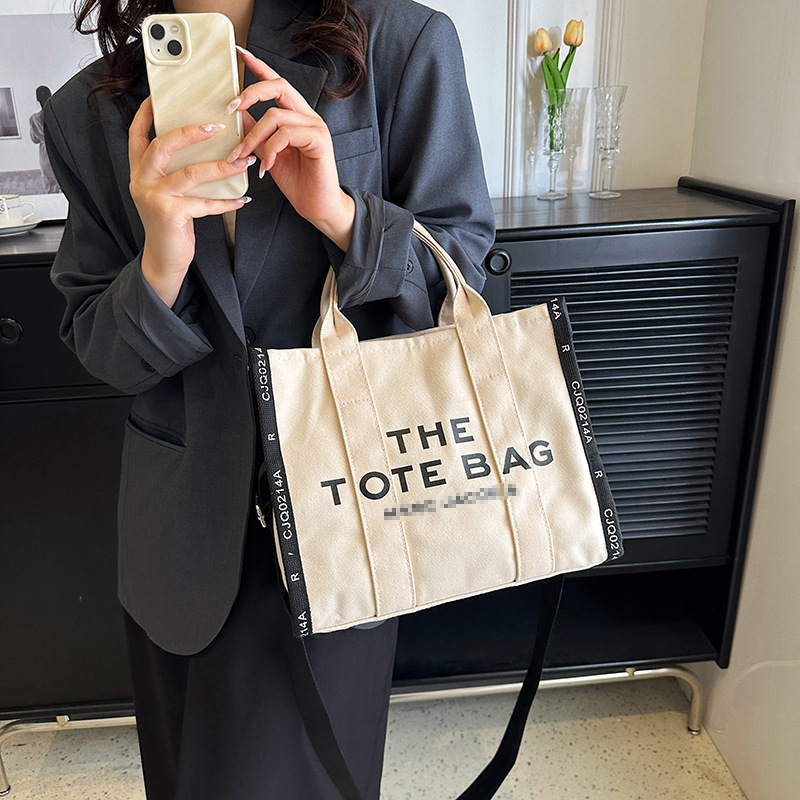 Bolso de hombro transfronterizo para mujer de gran capacidad 2025 bolso diagonal de viajero de letras simples de invierno bolso de lona de diseño de nicho