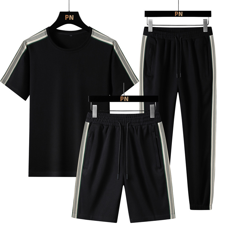 Verano nuevo estilo suelto tendencia hombre estilo Hong Kong camiseta de manga corta deporte de dos piezas marca de moda traje casual hombres y mujeres