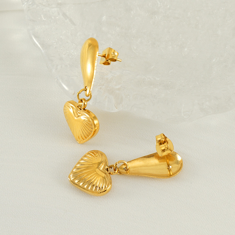 Pendientes colgantes de amor de acero inoxidable geométrico de diseño de estilo europeo y americano INS Pendientes simples de acero de titanio dorado de 18 quilates mujeres