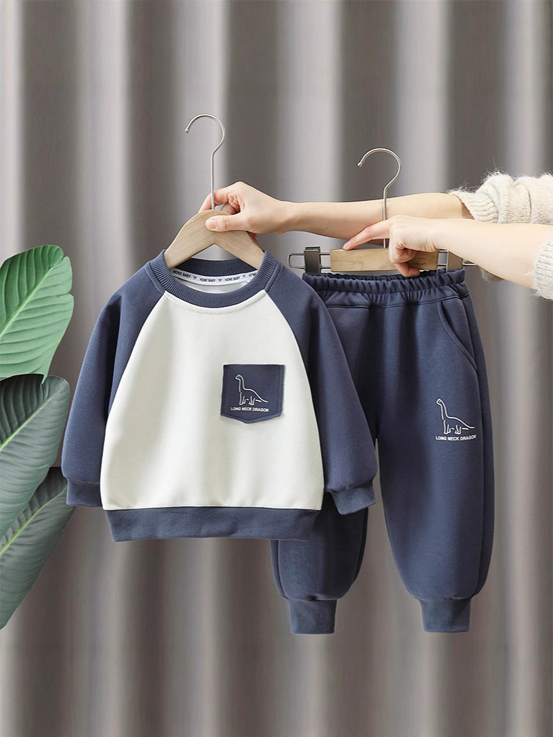 7105 traje de primavera para bebés 2025 nuevo suéter de manga raglán de dibujos animados para niños de dos piezas de primavera y otoño