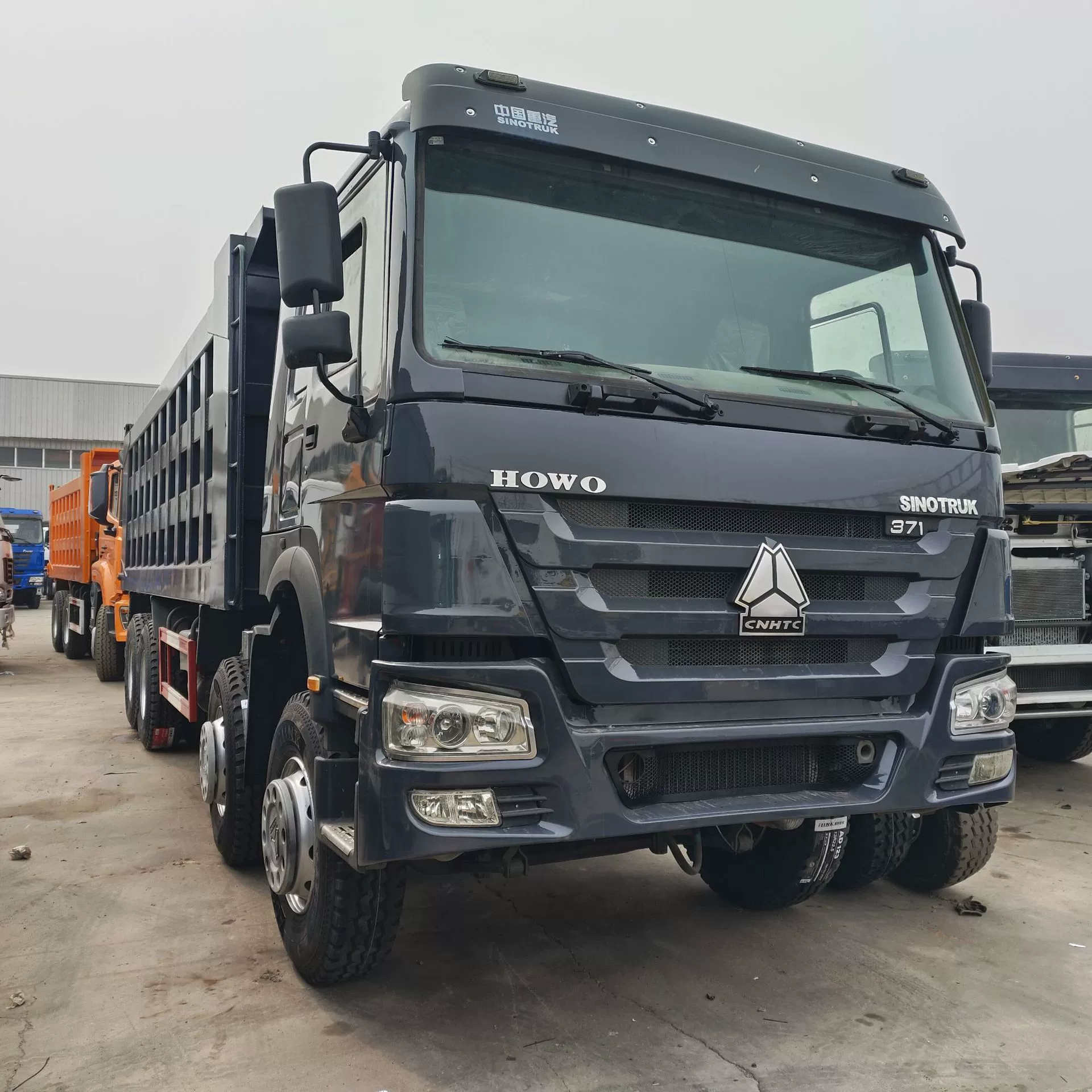 Экспорт Замбии SINOTRUK HOWO 6X4 задний восьмиколесный самосвал для горных работ SINOTRUK HOWO 371 л.с. тягач