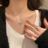 Ожерелье с бантом в шахматный узор